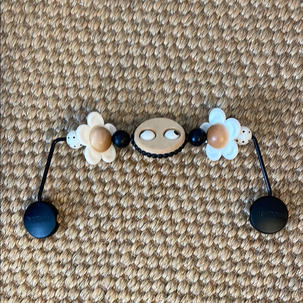 Baby bjorn bouncer toy in Black and Cream